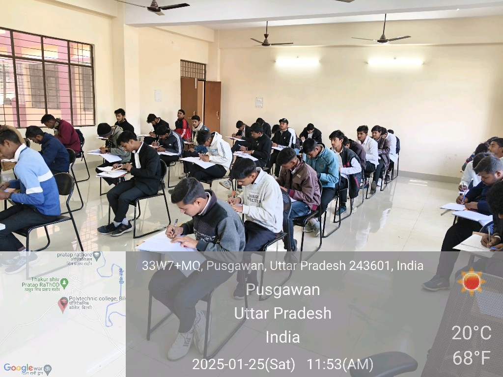 Students focused on writing during a classroom examination, January 25, 2025