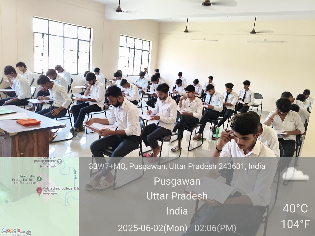 Students in white uniforms taking an examination in a classroom, June 2, 2025