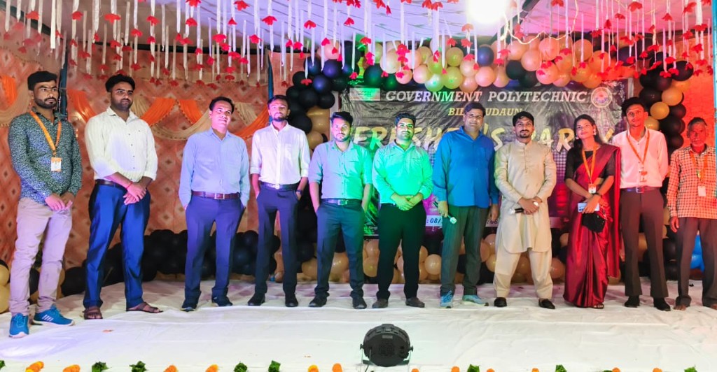 Fresher's Party faculty and students group photo on stage